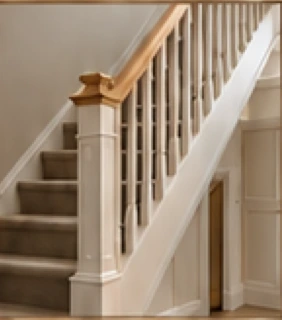 Illustrative staircase with oak handrail and white balustrade